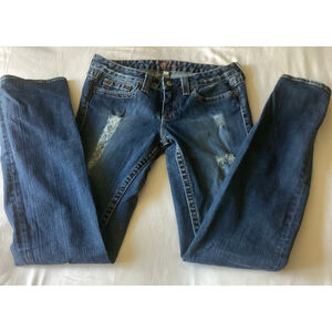 NWOT BEBE Women’s Distressed Denim Jeans with White Rhinestones Back Pockets.
